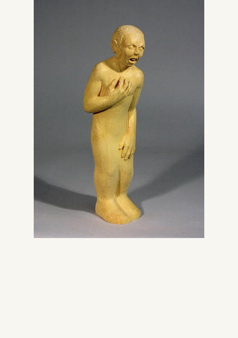 Softened by Grief, sculpture by wood carver Paul Reiber